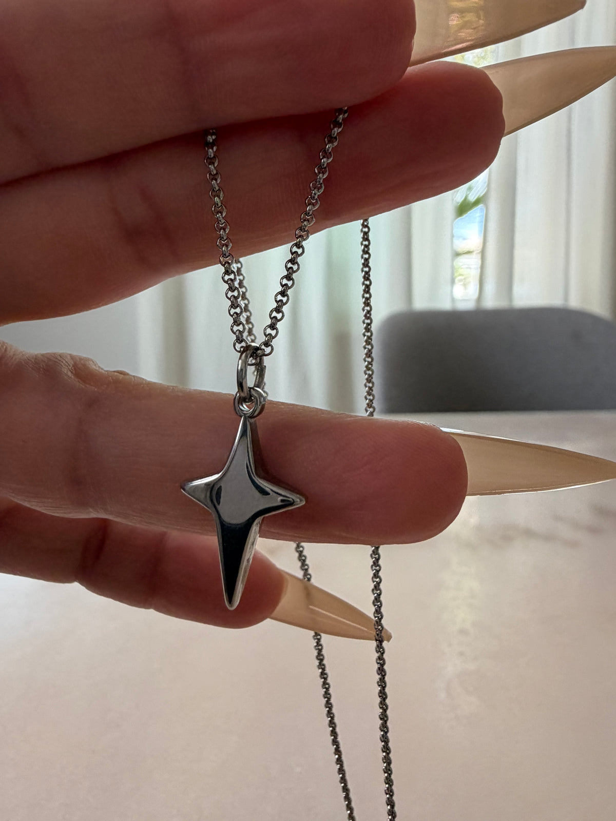 CELESTIAL STAR CHARM NECKLACE