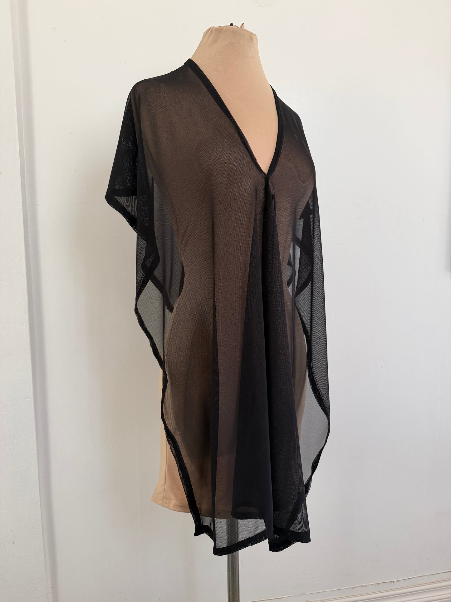 Asymmetrical sheer top | poncho