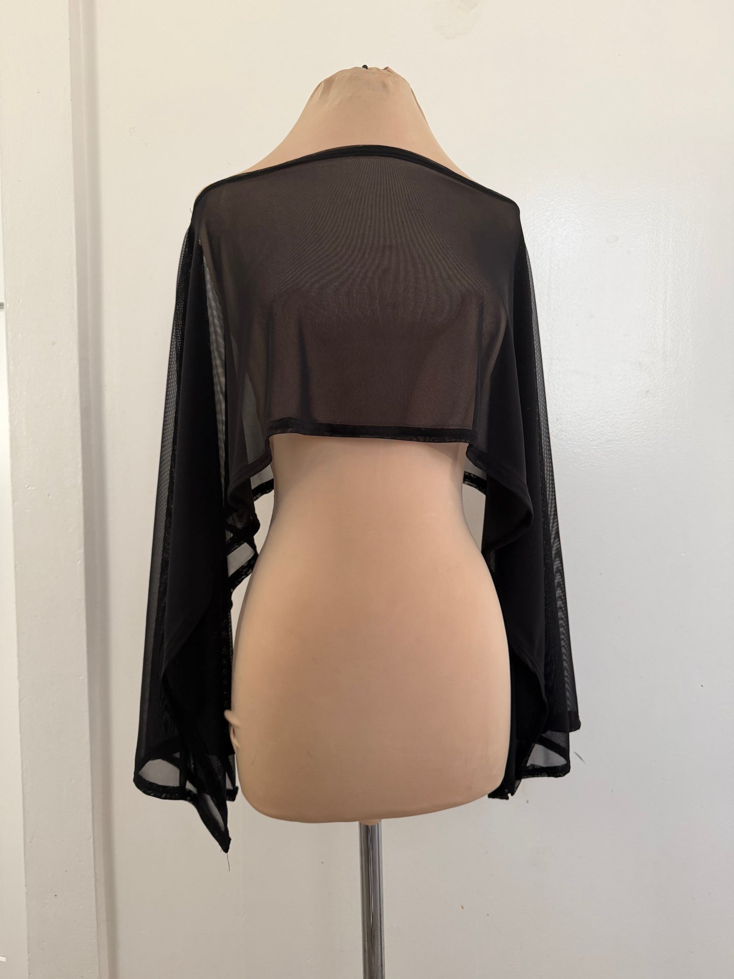 Asymmetrical sheer top | poncho