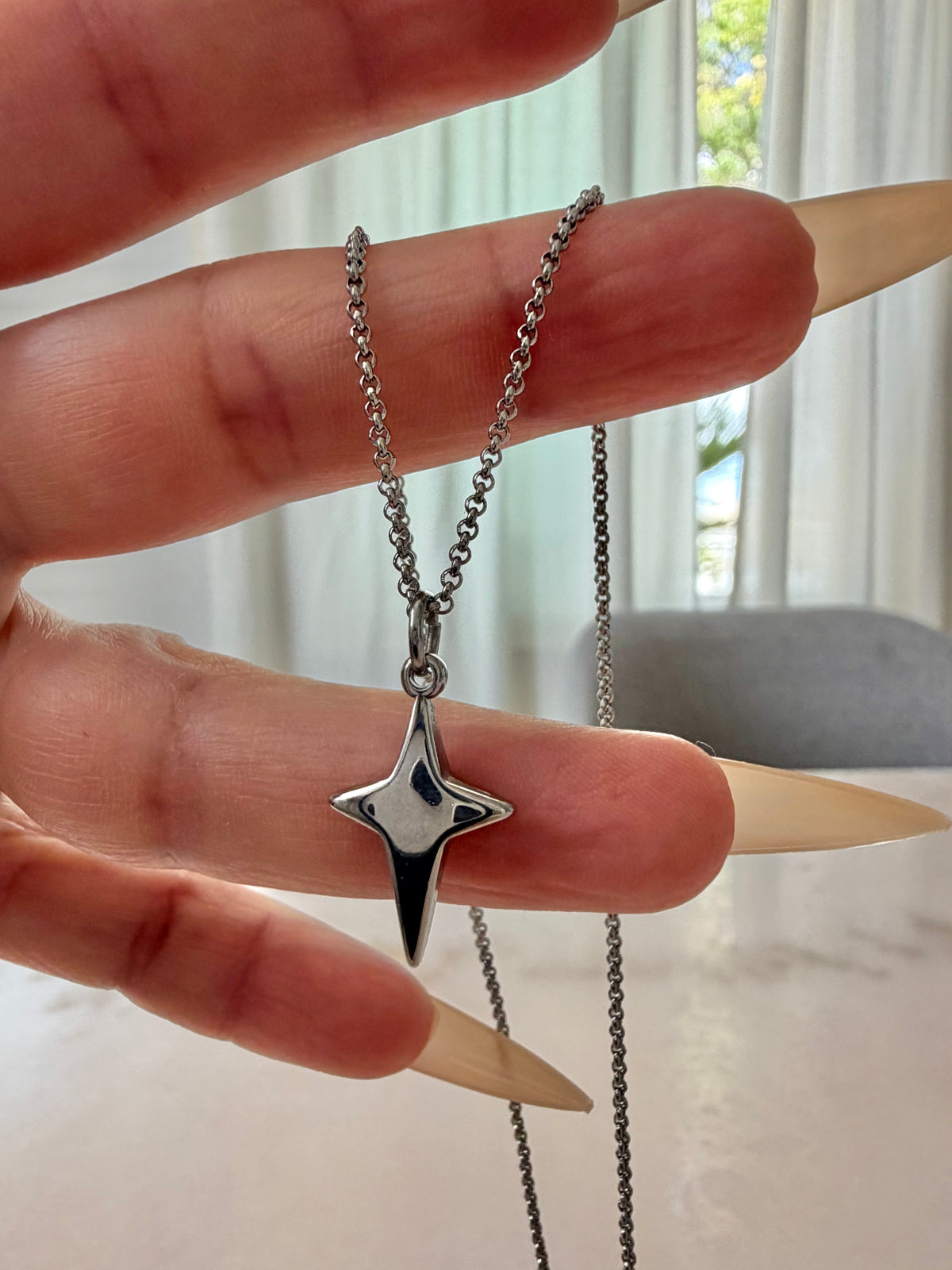 CELESTIAL STAR CHARM NECKLACE