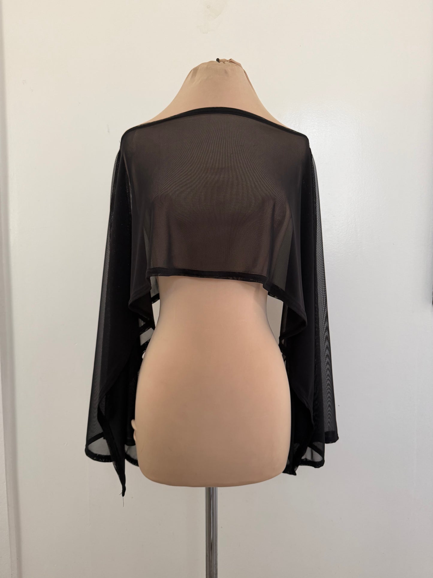 Asymmetrical sheer top | poncho