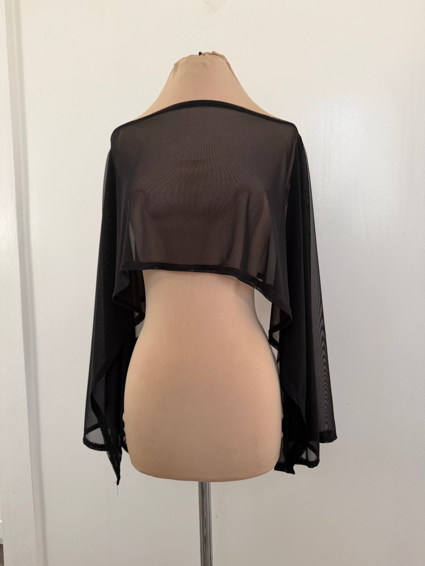 Asymmetrical sheer top | poncho